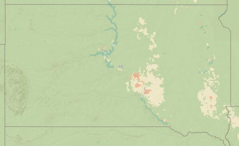 Map of South Dakota showing Fusarium head blight risk. Green indicates low risk, yellow moderate risk, and red high risk. Most of the state is green except for scattered, yellow areas within Edmunds, Faulk, Hyde, Hand, Buffalo, Jerauld, Brule, Aurora, Turner, Lincoln, McCook, Lake, Brookings, and Kingsbury counties. Some red, high risk areas are in Buffalo, Brule, Hyde, and Minnehaha counties.
