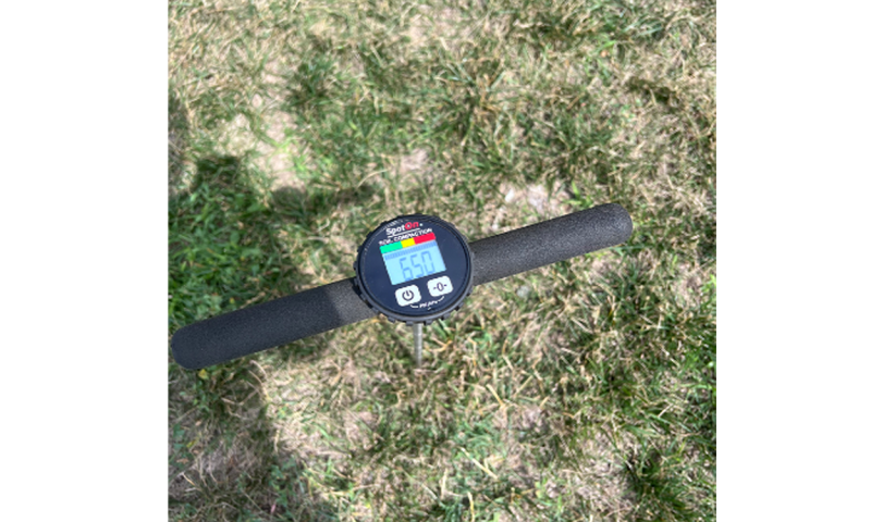 Soil penetrometer driven into soil.
