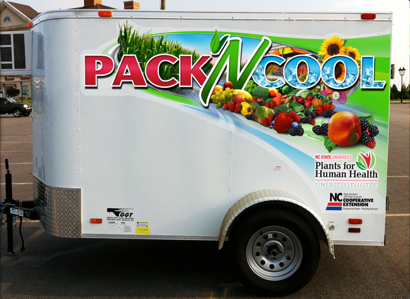 A medium-sized cooler trailer with &quot;Pack N Cool&quot; lettering on the side