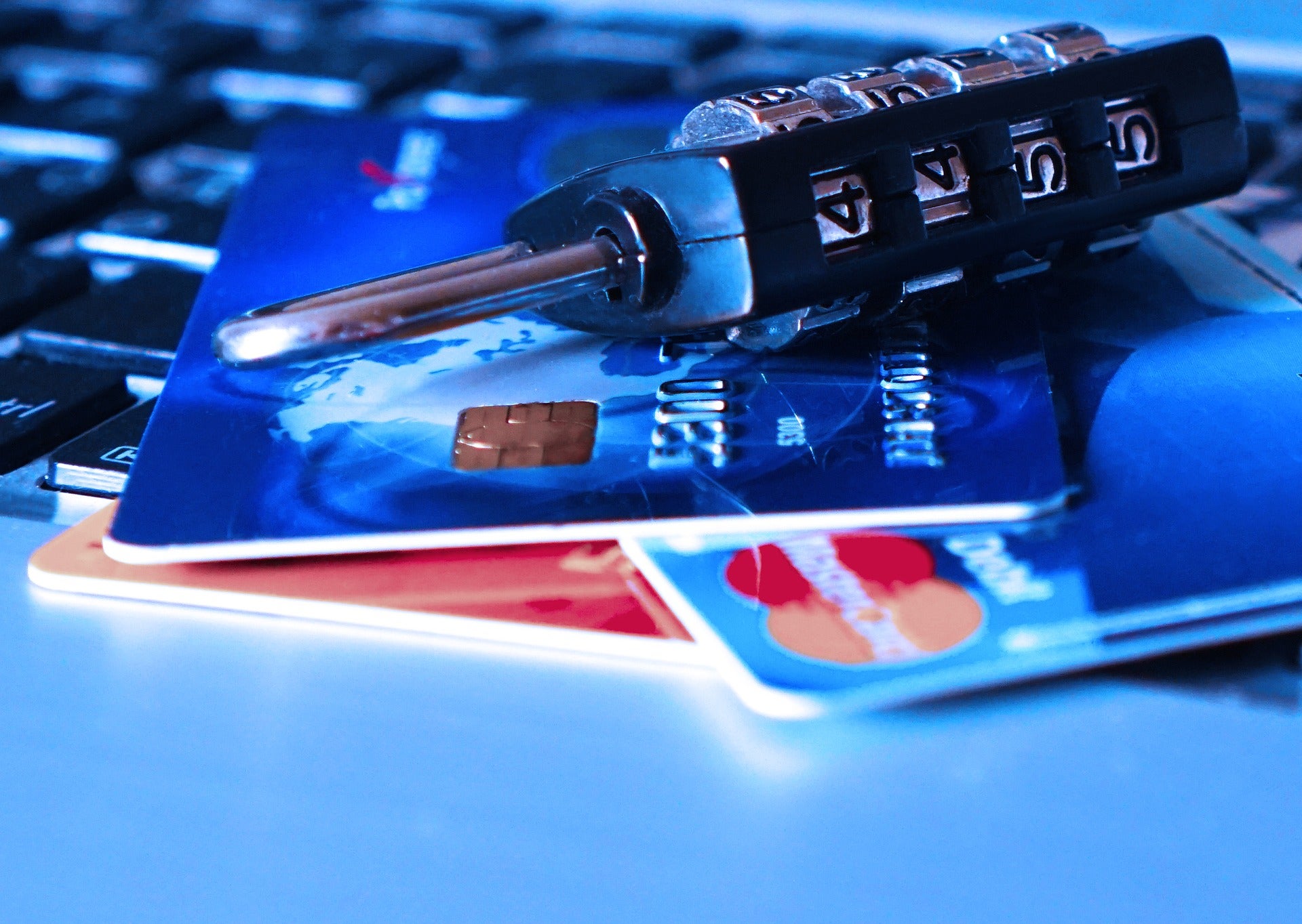 an image with credit cards and a combination lock