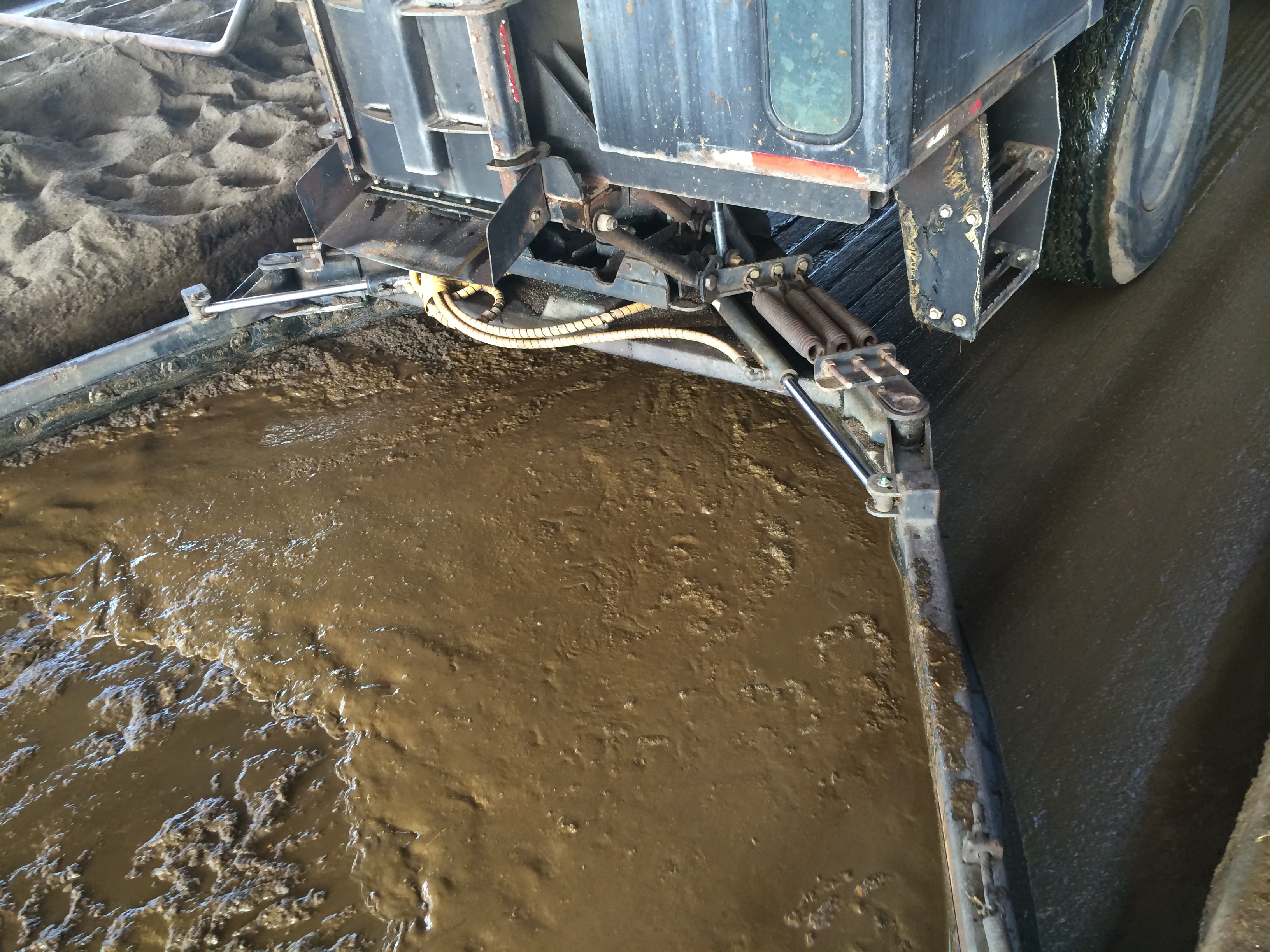 A manure pit in a dairy facility.