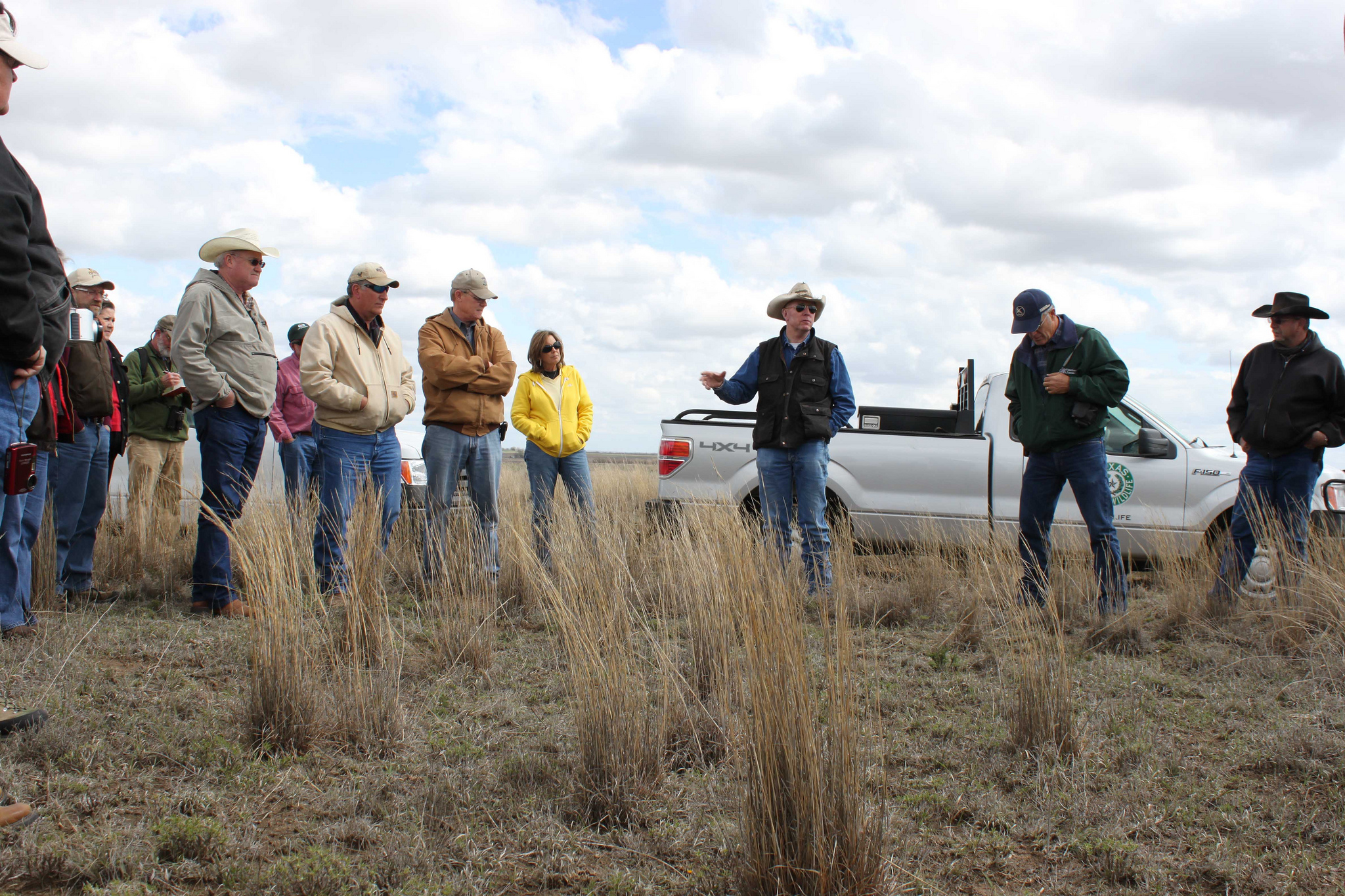 A group of ranchers meeting out in the range.
