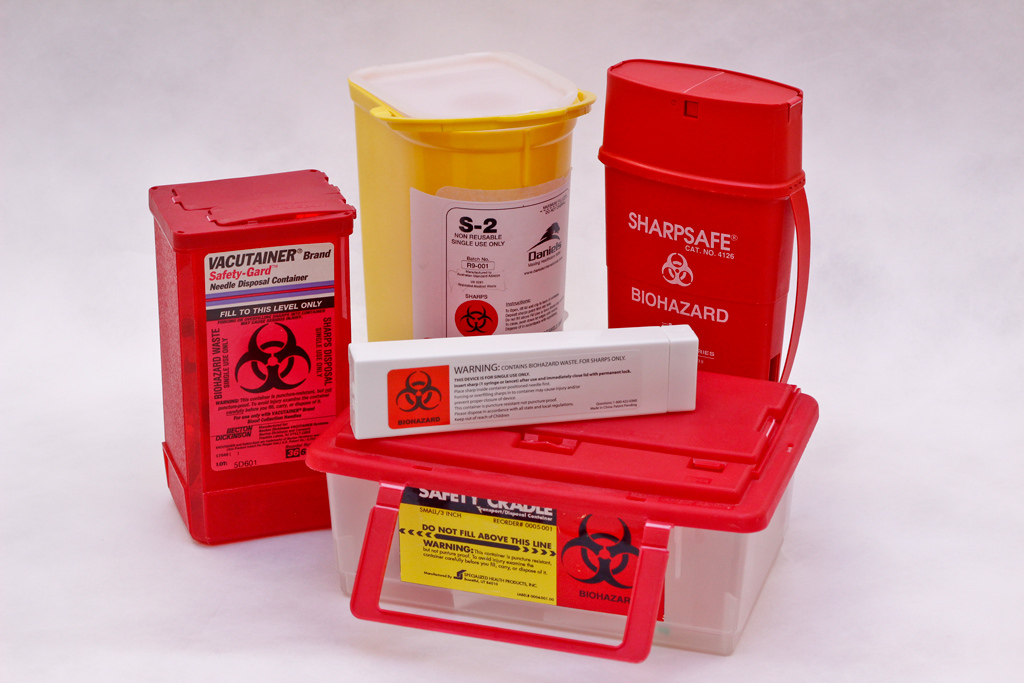 FDA-approved sharps disposal containers.