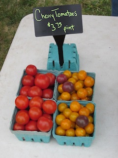 an image of red and yellow cherry tomatoes