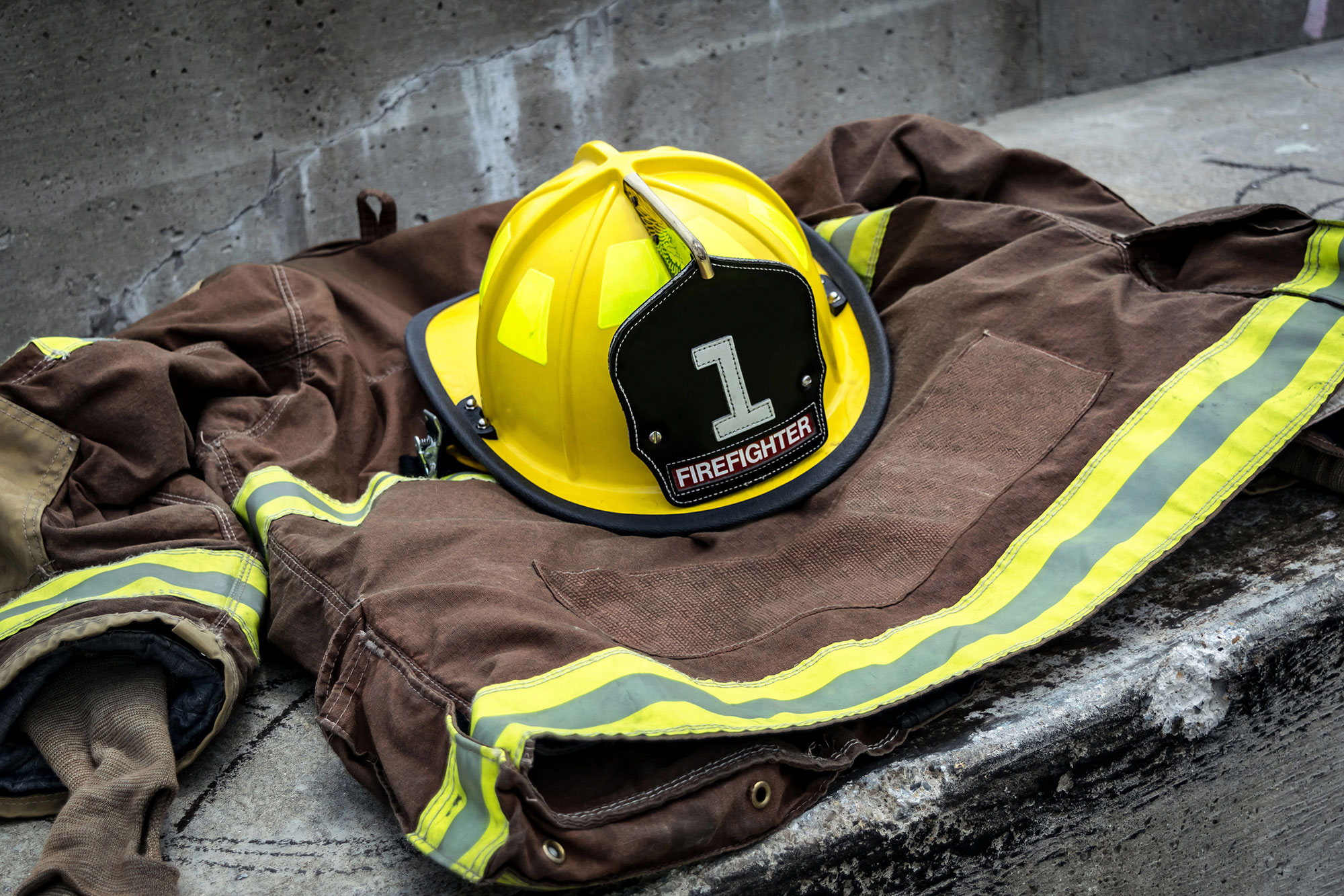 a fireman's jacket and helmet