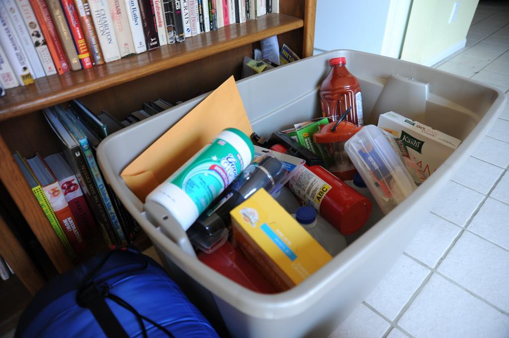 A family emergency kit in a gray plastic tote. Photo by Zachary Kittrie