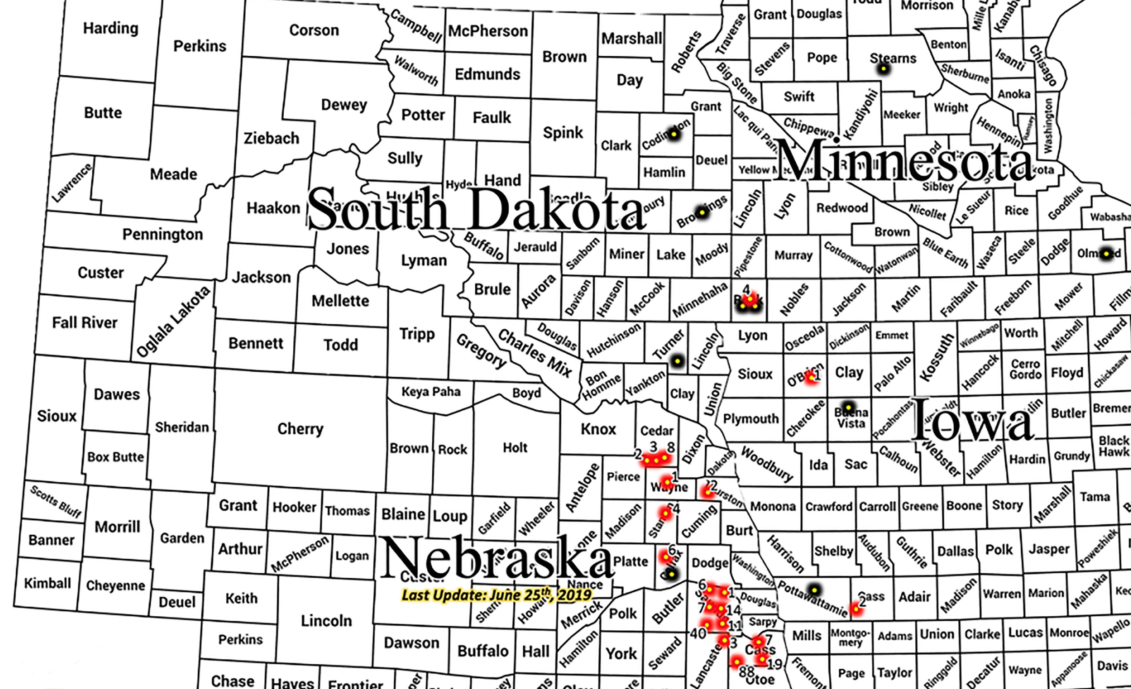 Black and white county map of South Dakota, Minnesota, Nebraska and Iowa. Red dots within counties indicate soybean gall midge emergence. Black dots represent trap locations.