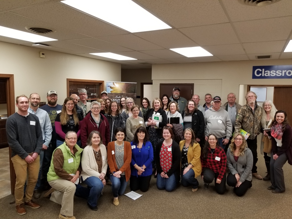 a group of people gathered after a conference