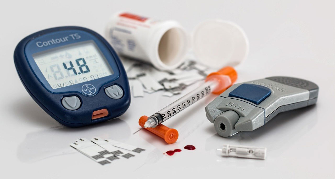 Assorted medical equipment for at-home diabetes testing and care.