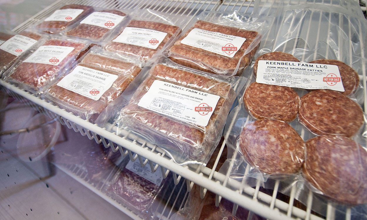 Variety of frozen meats in a freezer labeled with a red, “Not for Sale” stamp.