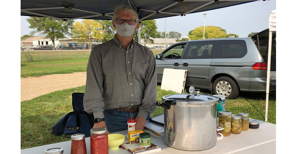 Tim Schreiner at his food preservation booth at the Vermillion Area Farmers Market.
