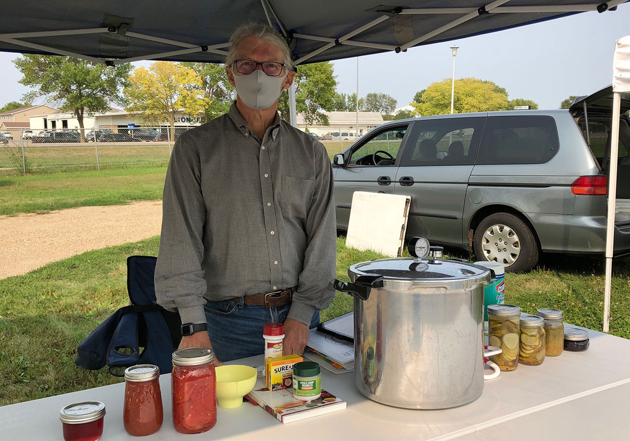 Tim Schreiner at his food preservation booth at the Vermillion Area Farmers Market.