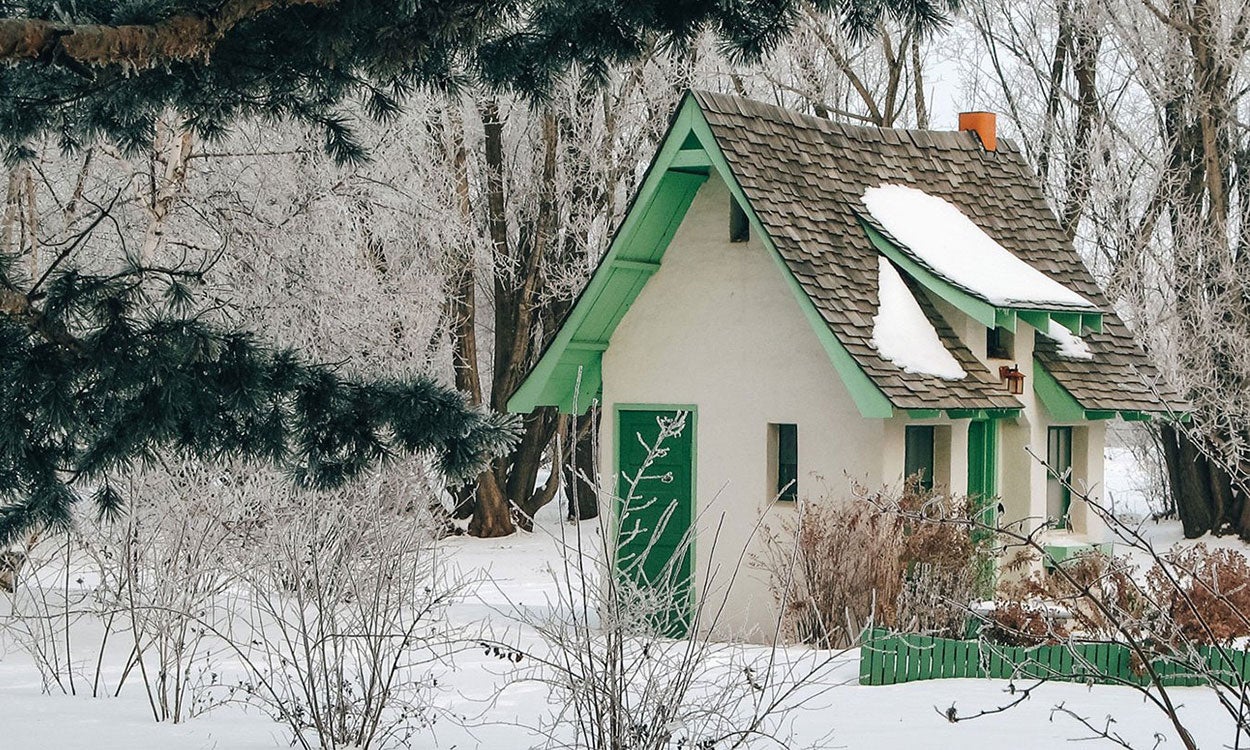 Snow-covered cottage at McCrory Gardens.