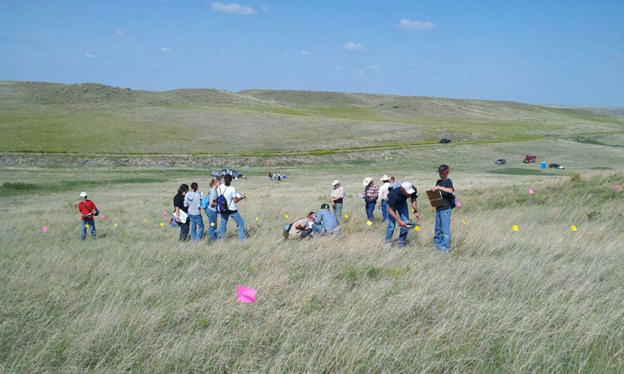 Participants inspecting a rangeland area during the South Dakota Rangeland Days event.