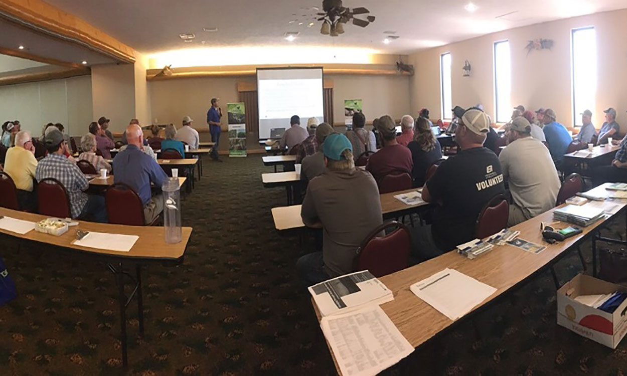 Group of farmers and ranchers attending a drought meeting.