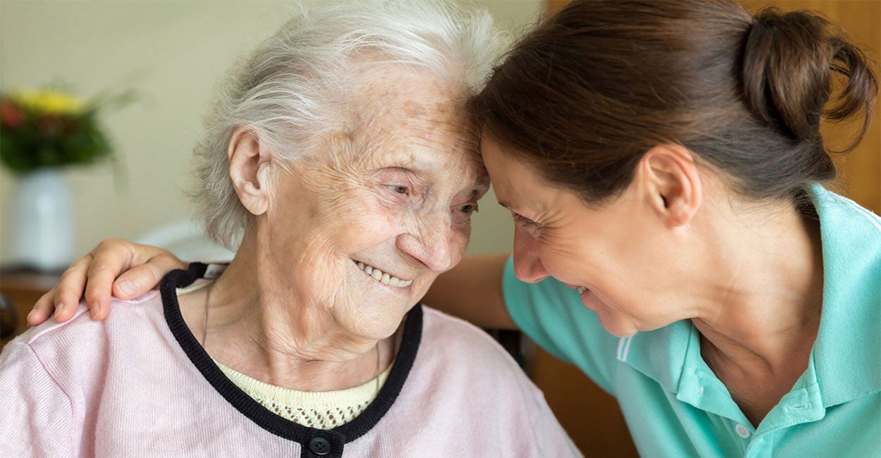 Senior woman with caregiver.