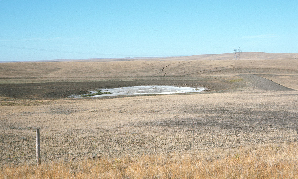 Dry, winter rangeland with minimal snow cover.
