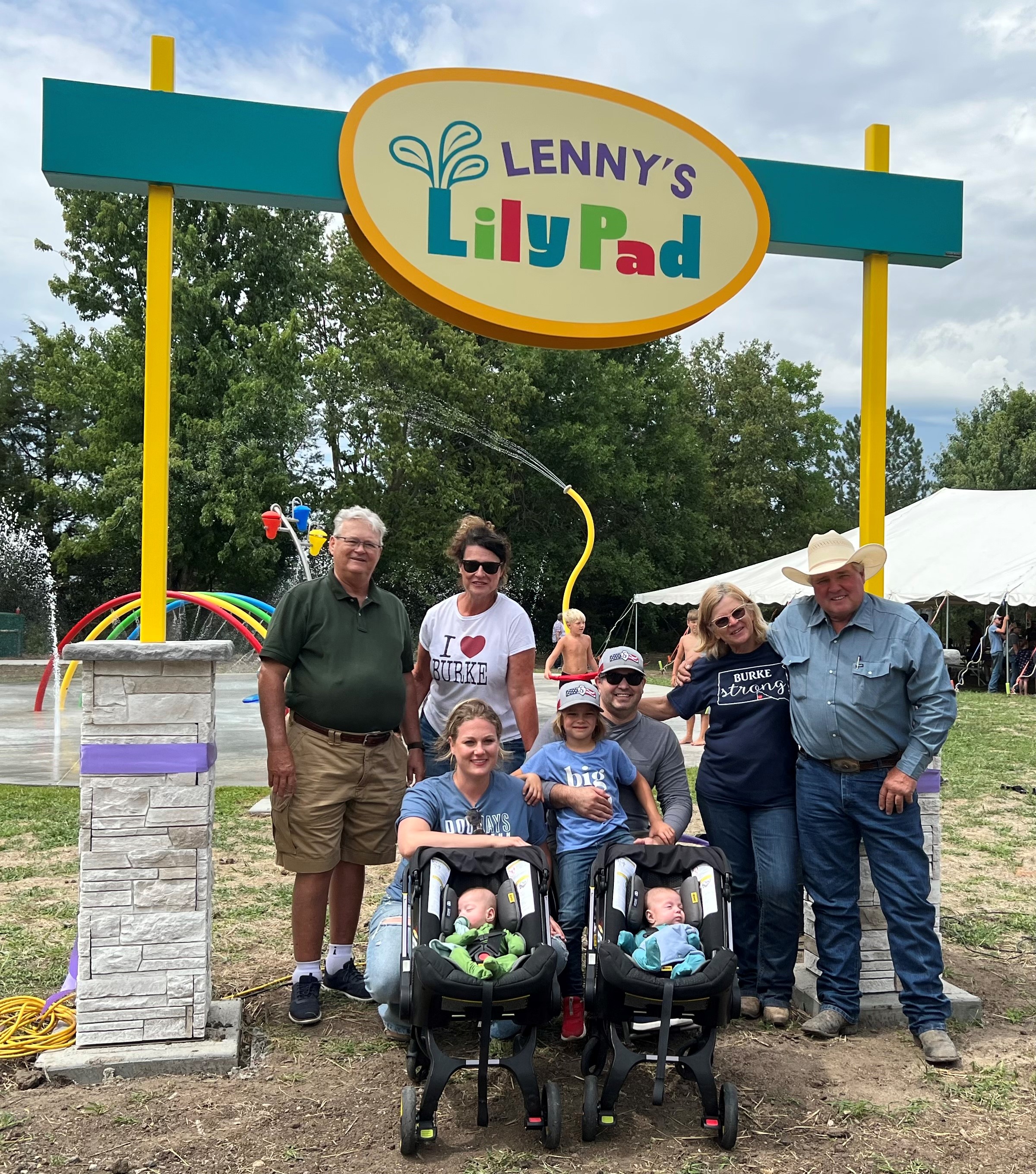Billie and Kelsea Sutton and, of Burke, South Dakota and their family in front of Lenny's Lily Pad