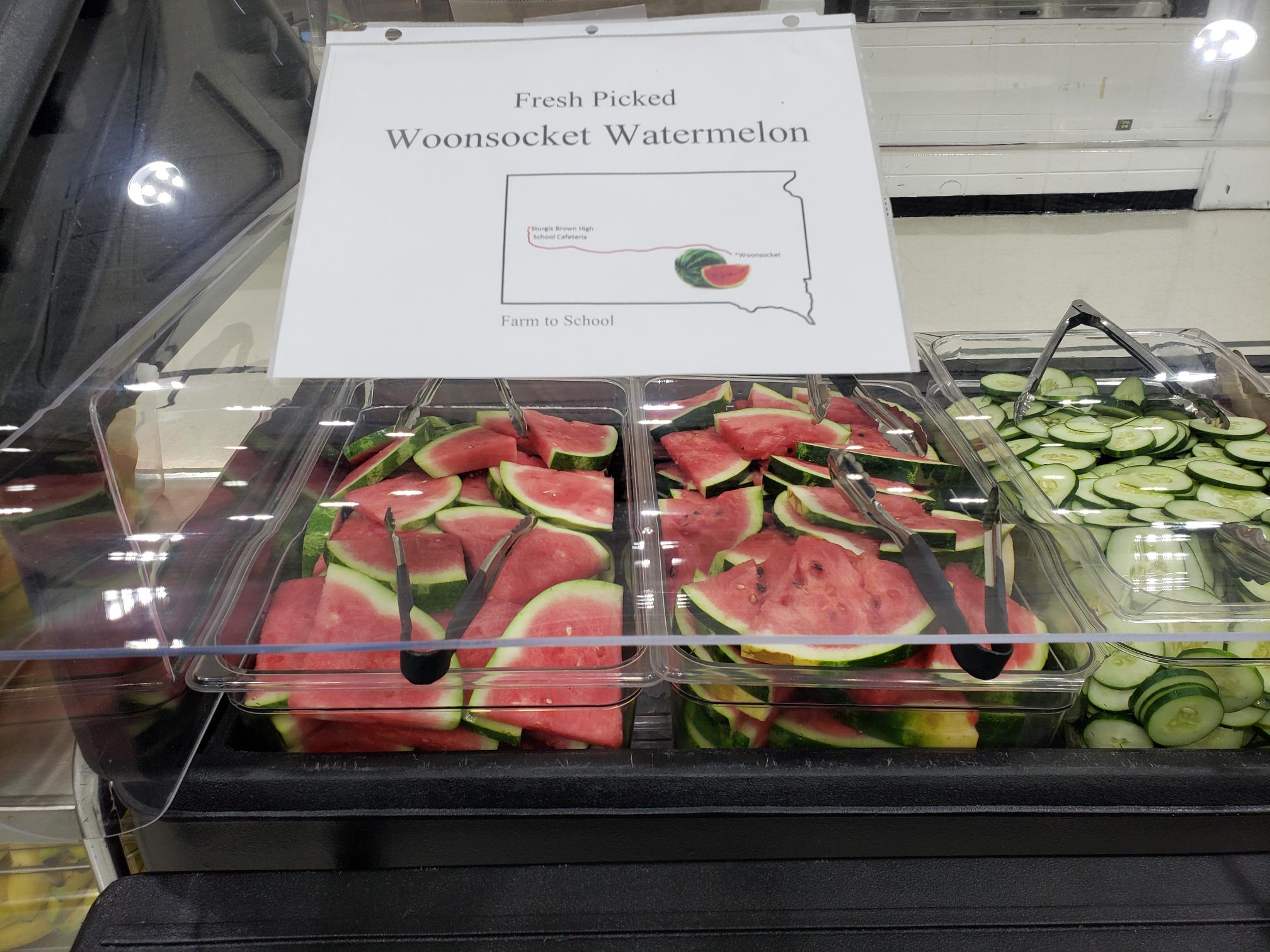Buffet of locally sourced watermelon served at a school lunch