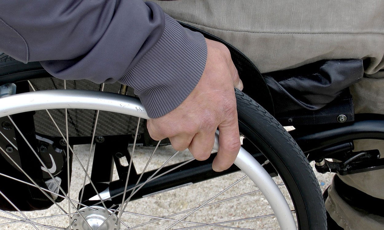 Man in wheelchair.