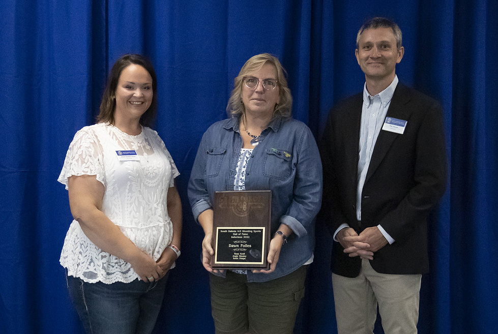 Jenae Hansen-Gross and Tim Tanner with Dawn Foiles, a 2022 Shooting Sports Hall of Fame recipient