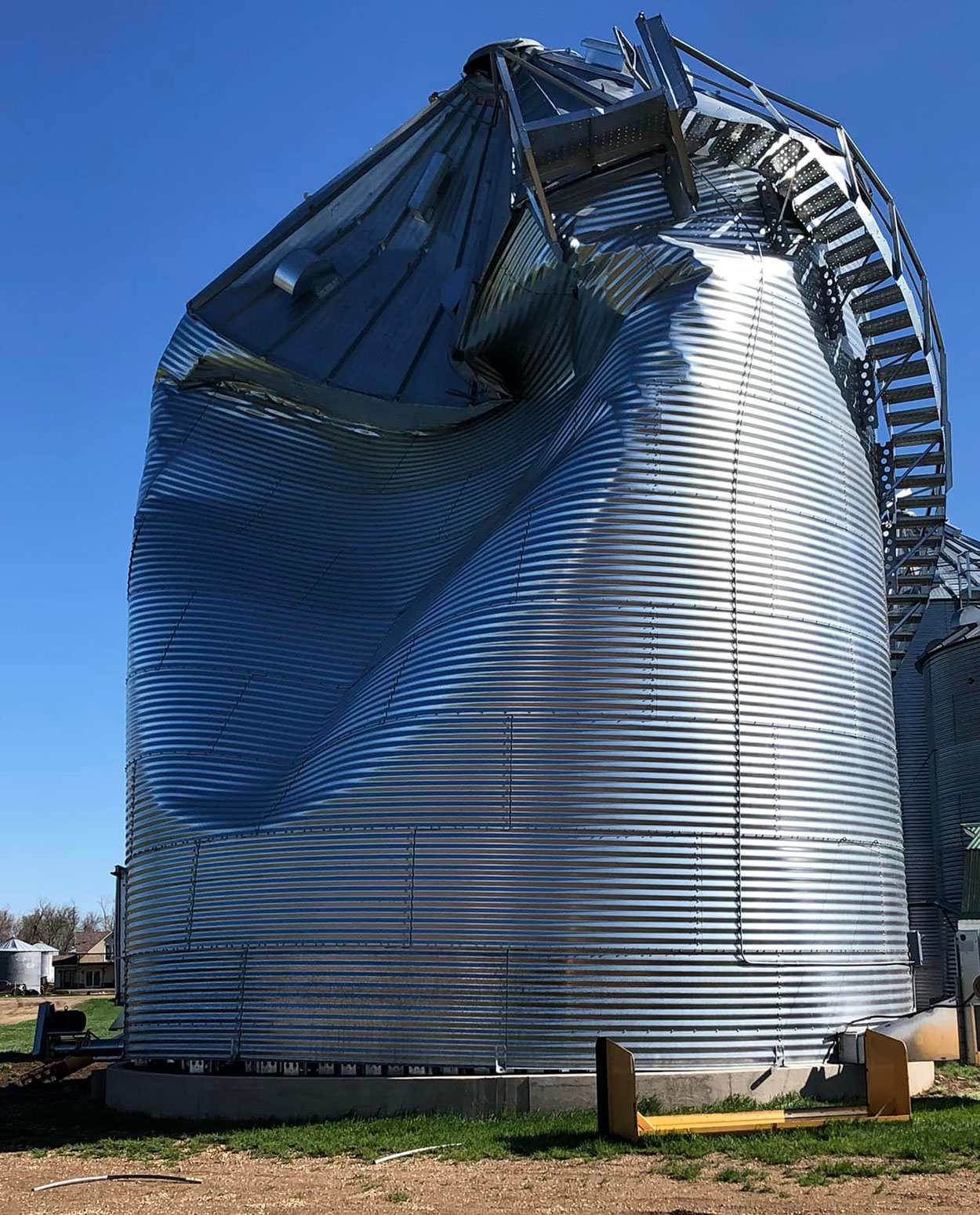 Storm-damaged grain bin.