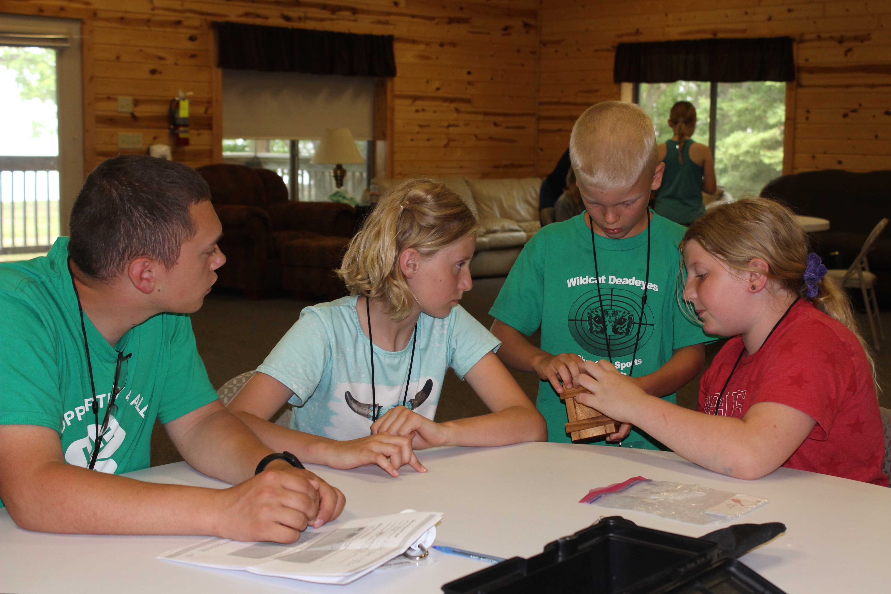 Youth campers working on a project together