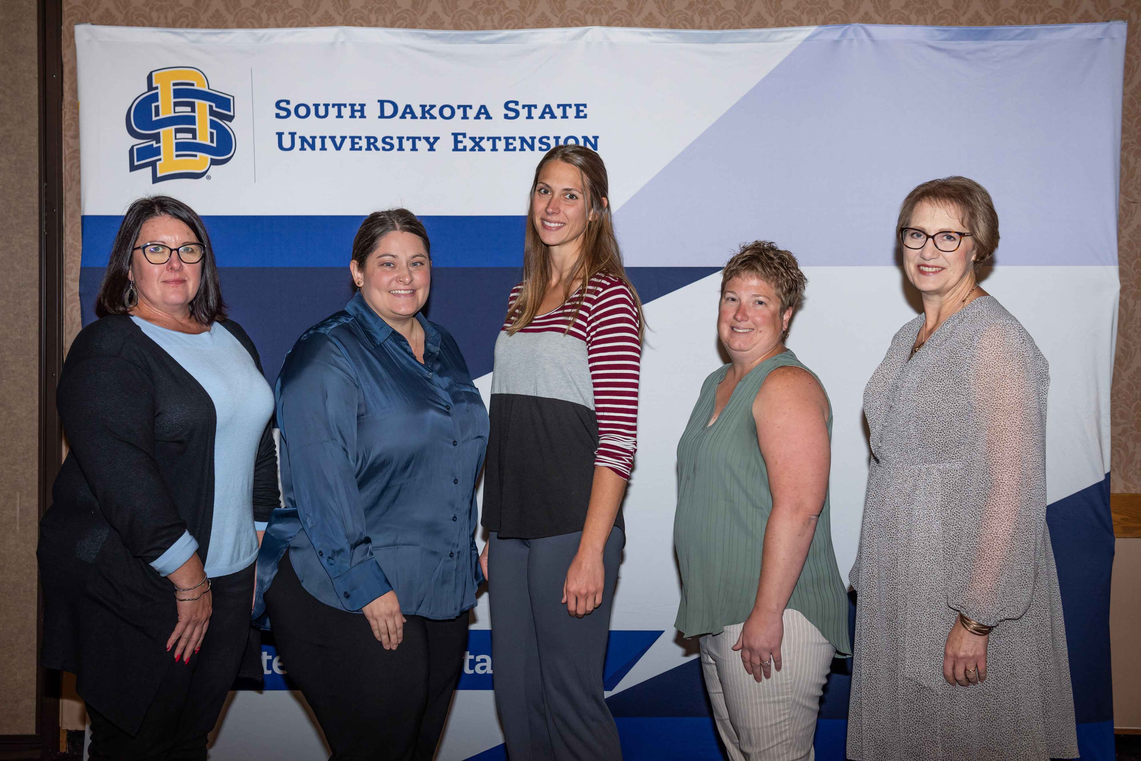 Jennifer Ringkob, Aubrey Anderson, Kara Harders and Audrey Rider received a Multi-Disciplinary Program Seed Grant from SDSU Extension Director Karla Trautman.
