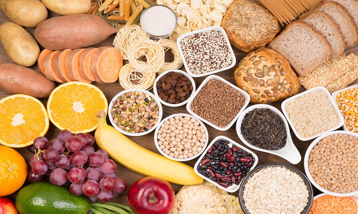 Variety of foods rich in carbohydrates.
