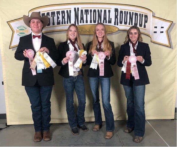 2024 Western National Roundup hippology team The hippology team smiles at the camera with their fourth-place ribbons
