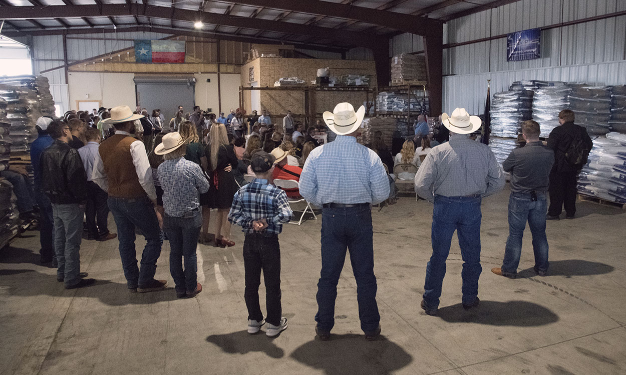 Group of farmers and ranchers gathered at an emergency meeting.