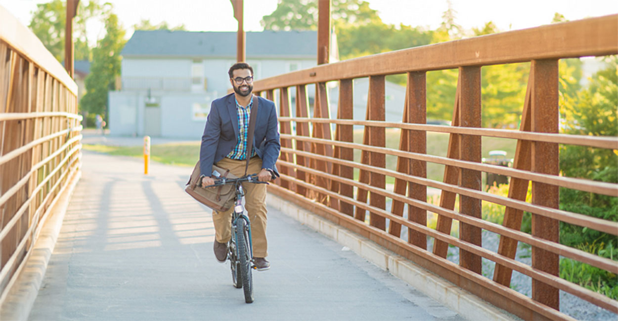 Man riding a bicycle to work.