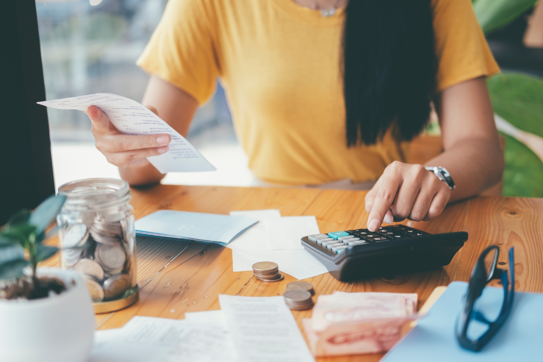Woman using a calculator