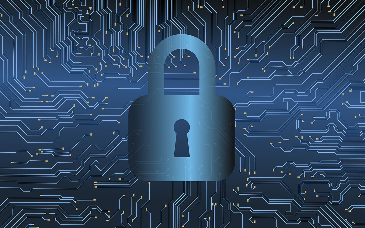 Digital padlock over a circuit board, representing data encryption.