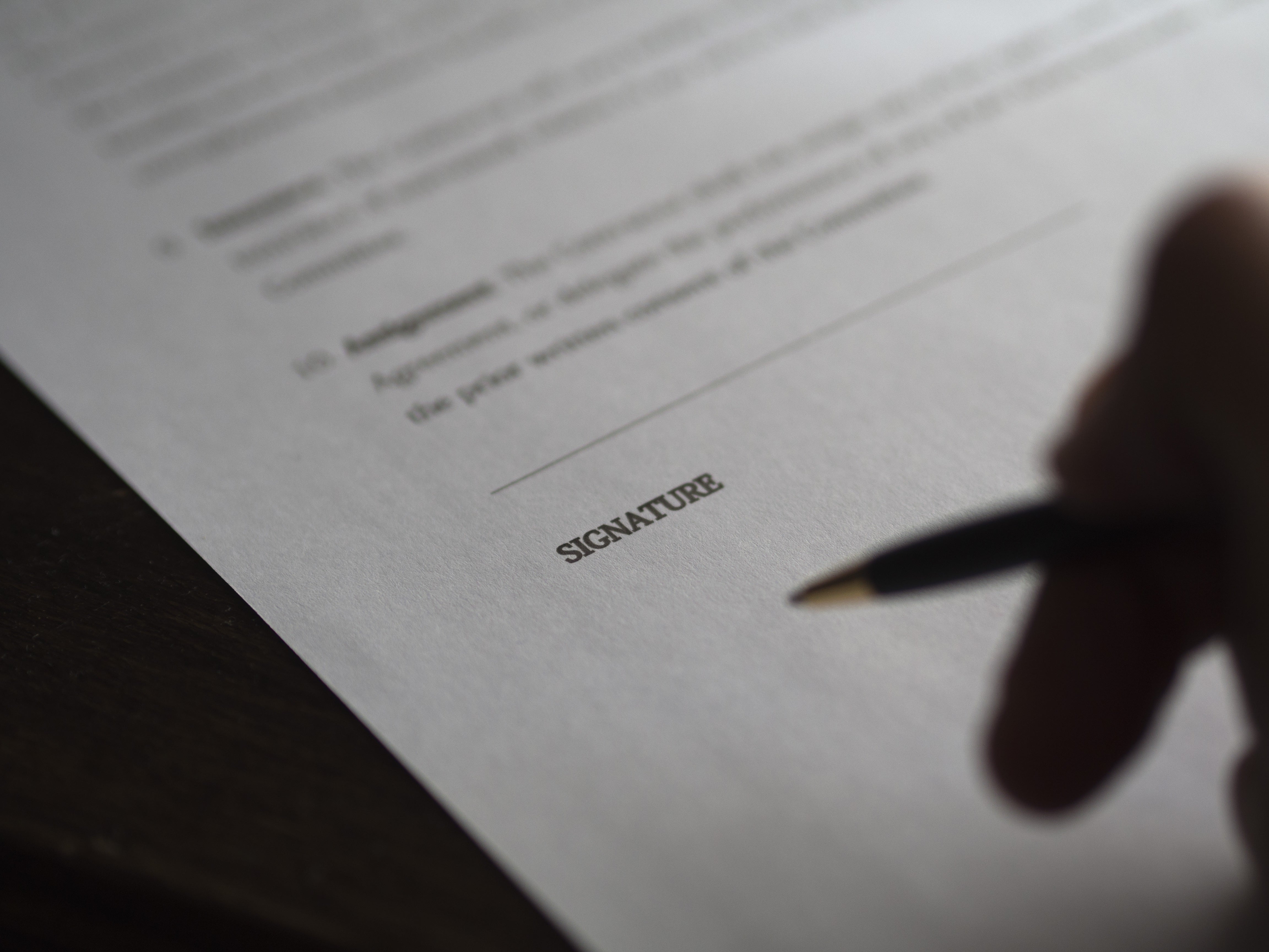 Contract Person signing a contract