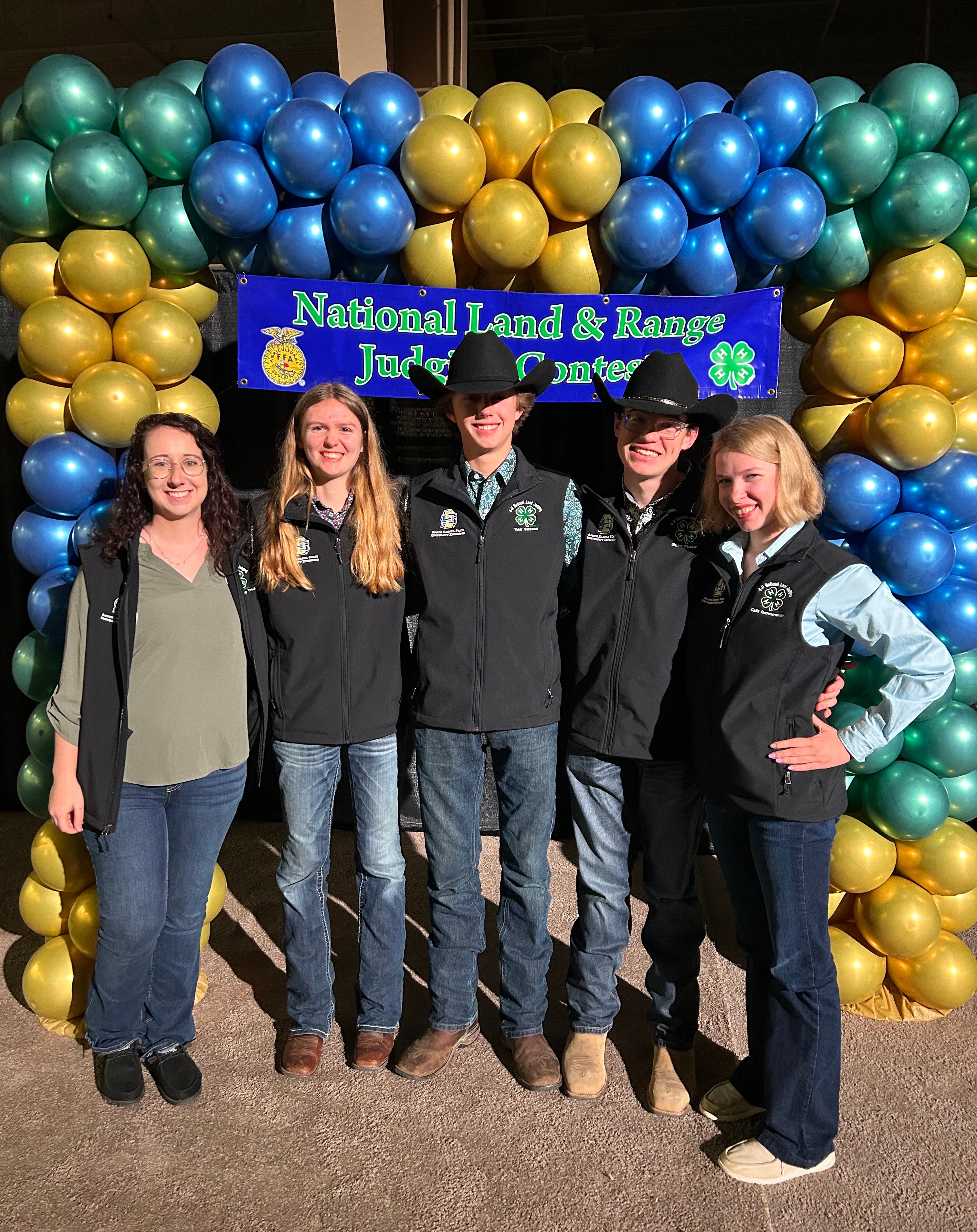 The Lennox 4-H Land team smiles at the camera
