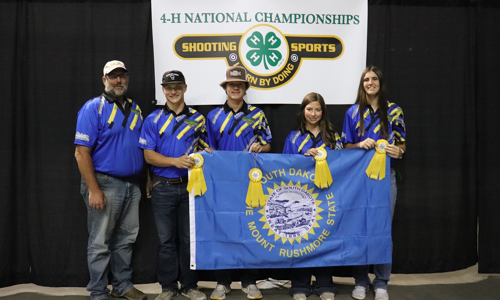 Group photo of the 2025 South Dakota 4-H National Shooting Sports Hunting Skills Team.