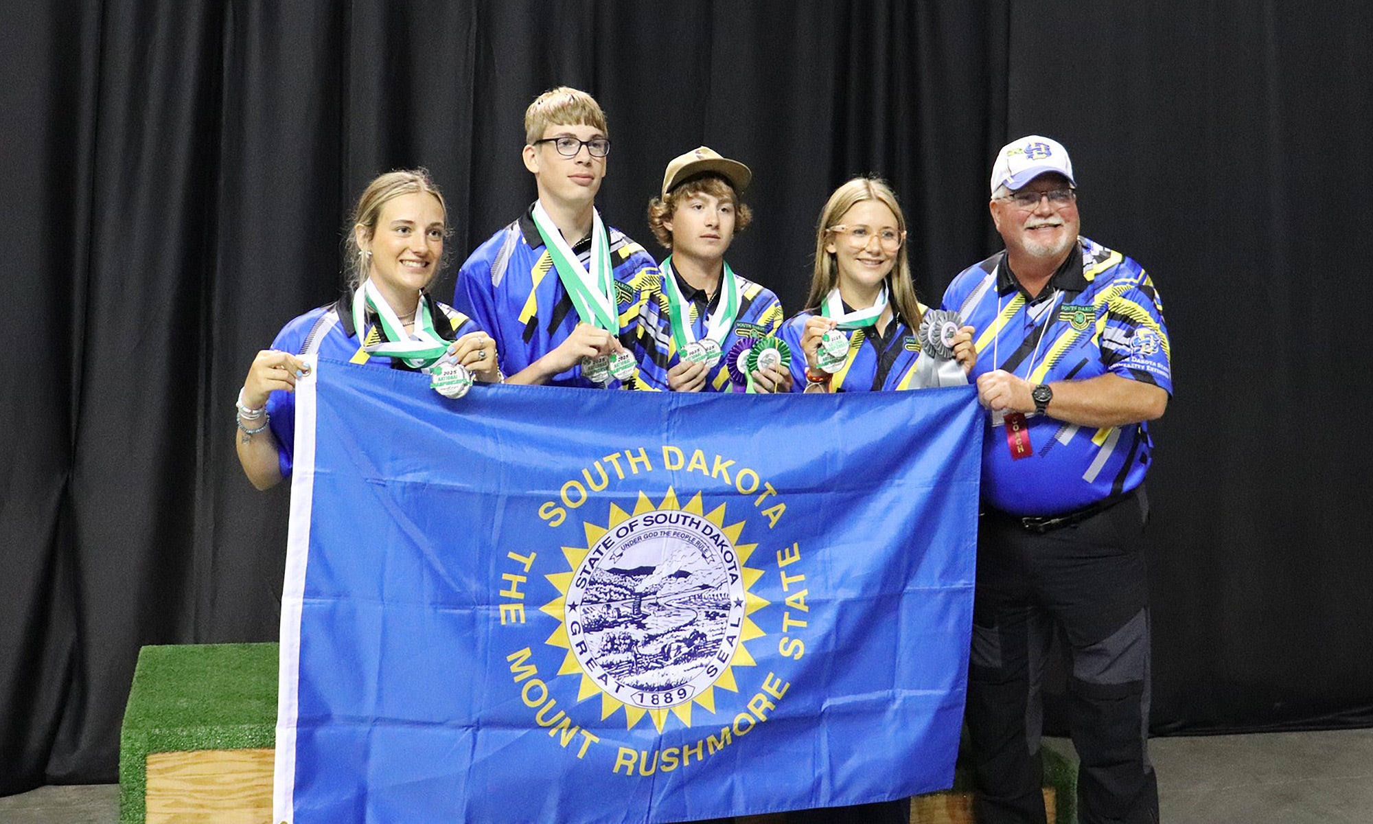Group photo of the 2025 South Dakota 4-H National Shooting Sports 22 Rifle Team.