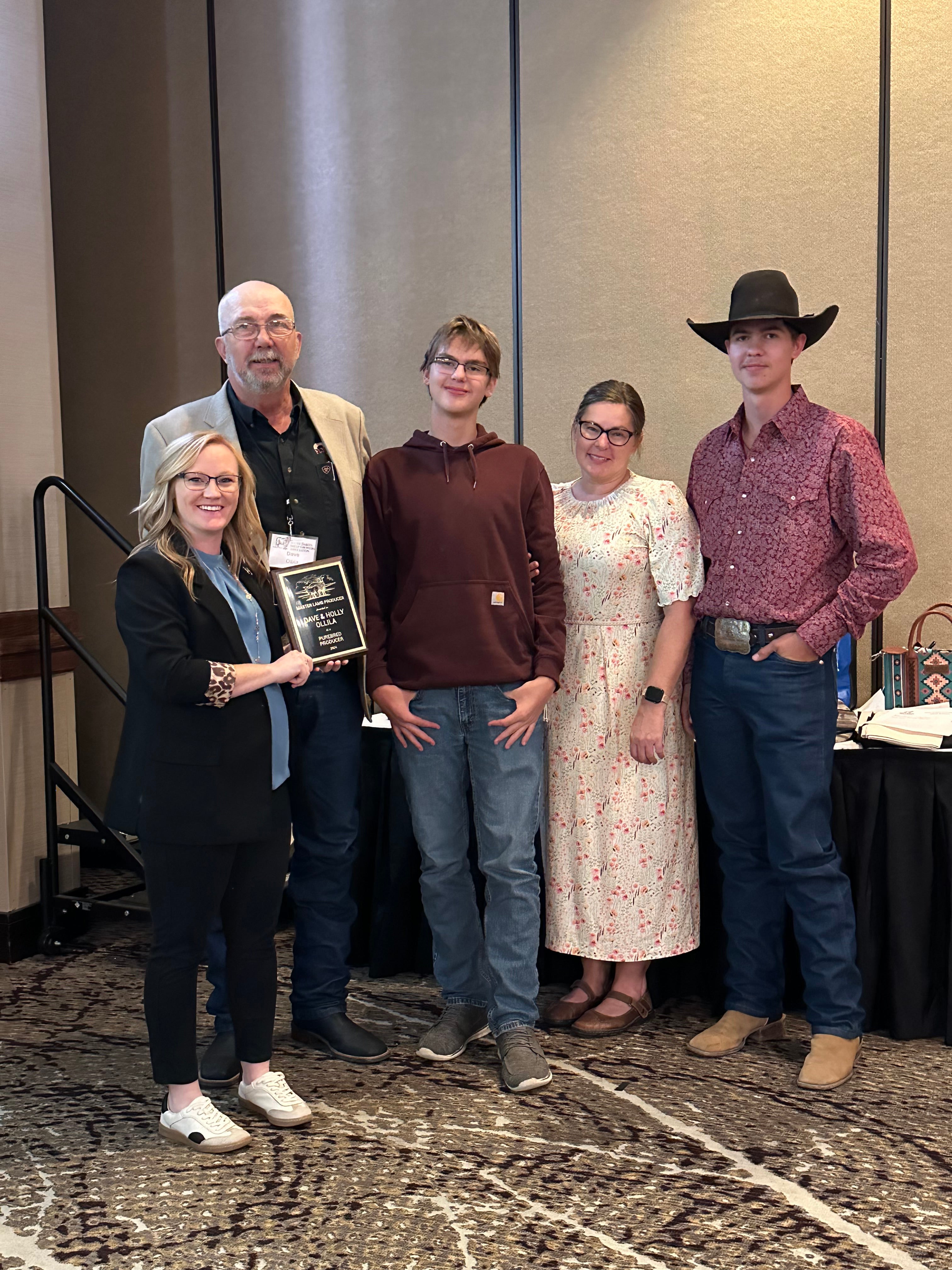 A family receives a plaque