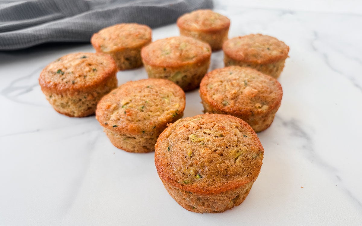 Savory muffins arranged on a countertop.