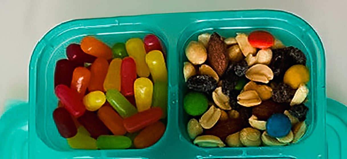 Candy and trail mix in Snackle Box cubes.