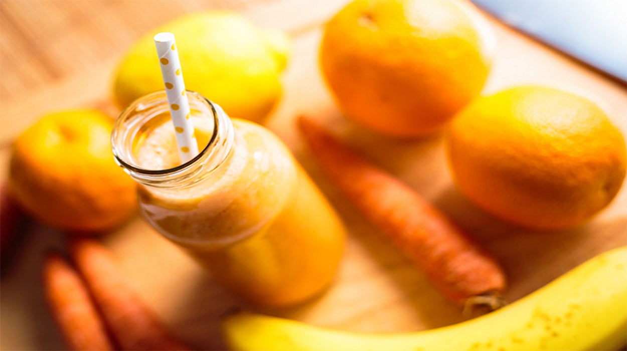 Banana, orange, and carrot smoothie.