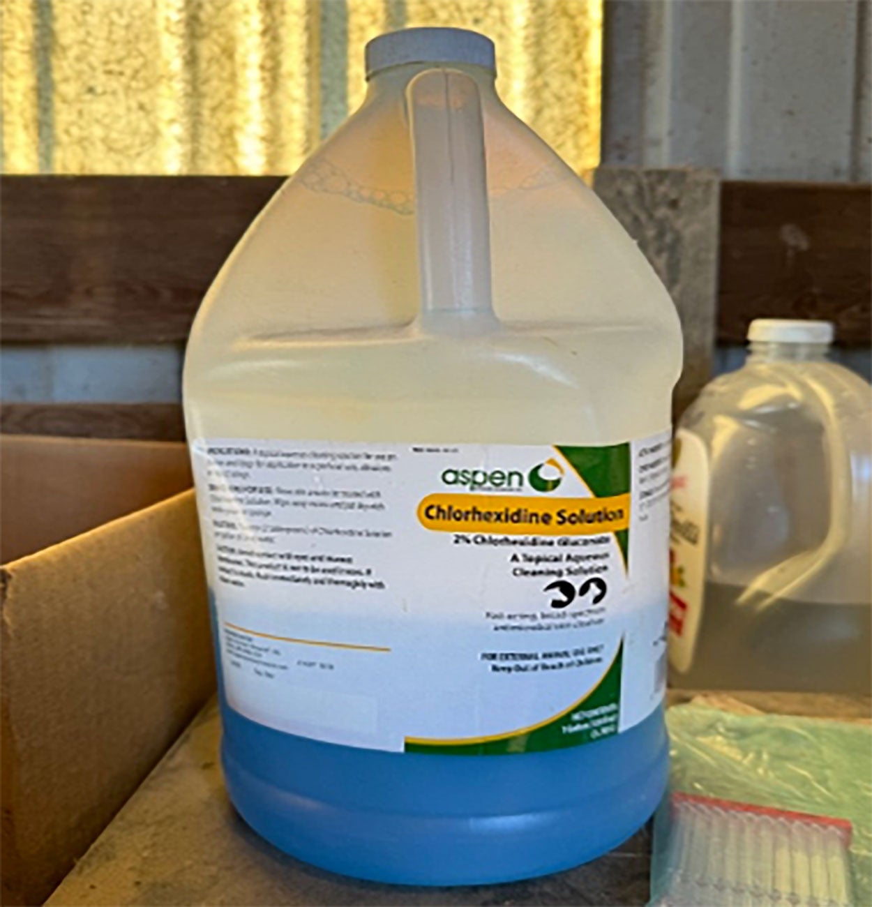 Bottle of disinfectant solution on a table.