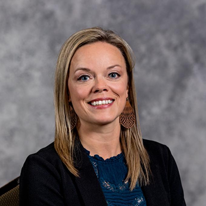 Professional headshot of Jillian Calmus