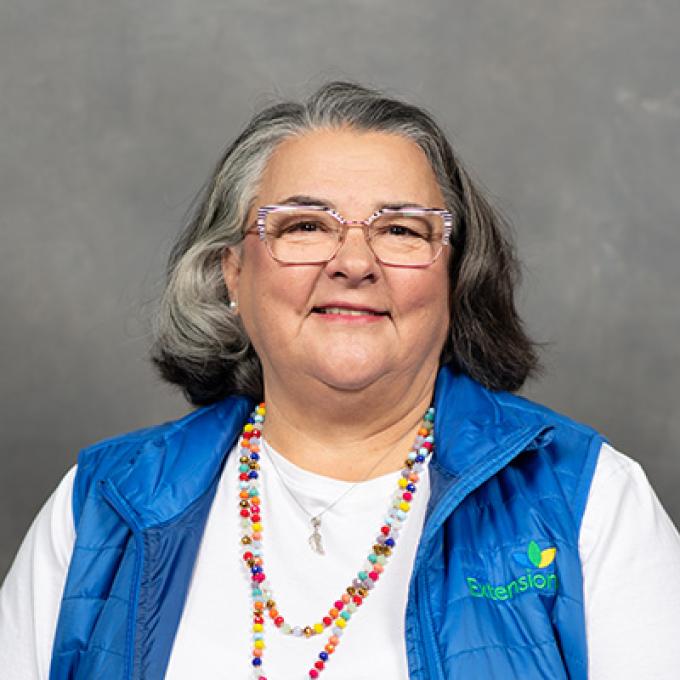 Professional headshot of Deb Lessman