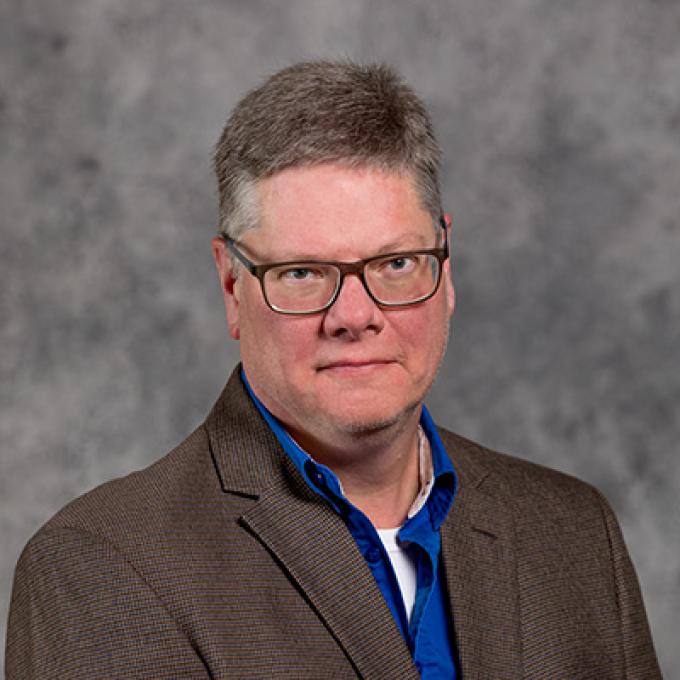 Professional headshot of David Kringen