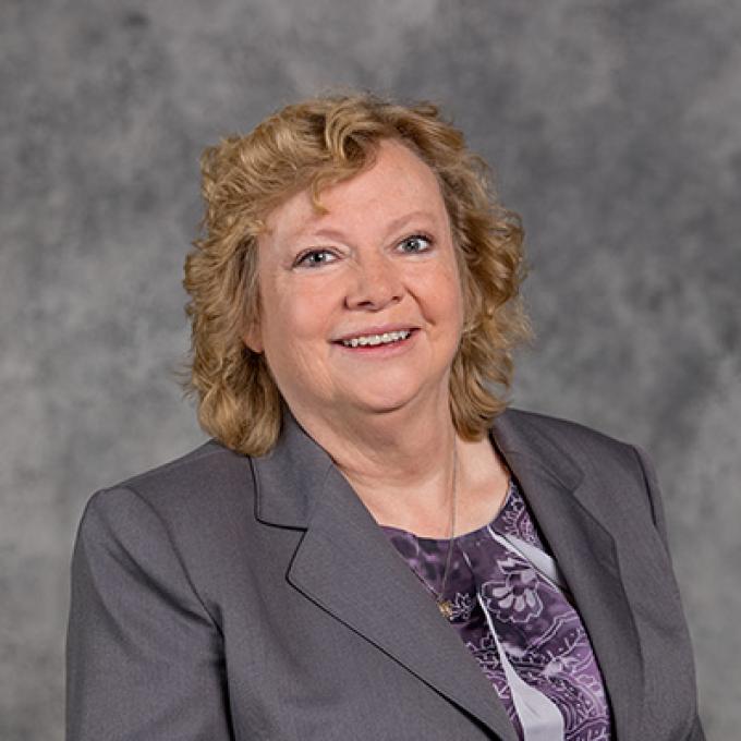 Professional headshot of Janice Rounds