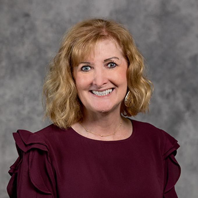 Professional headshot of Ann Schwader