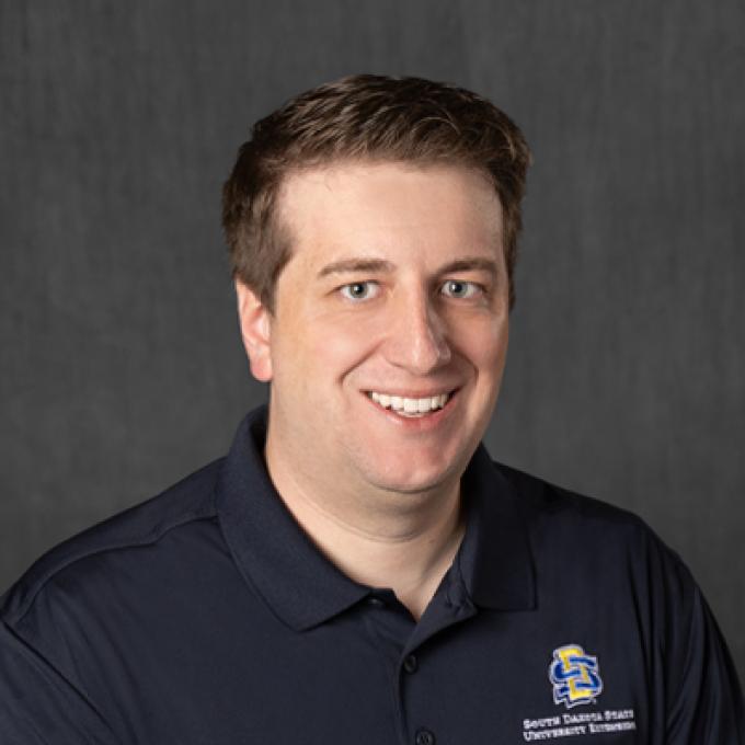 Professional portrait of Nick Volesky