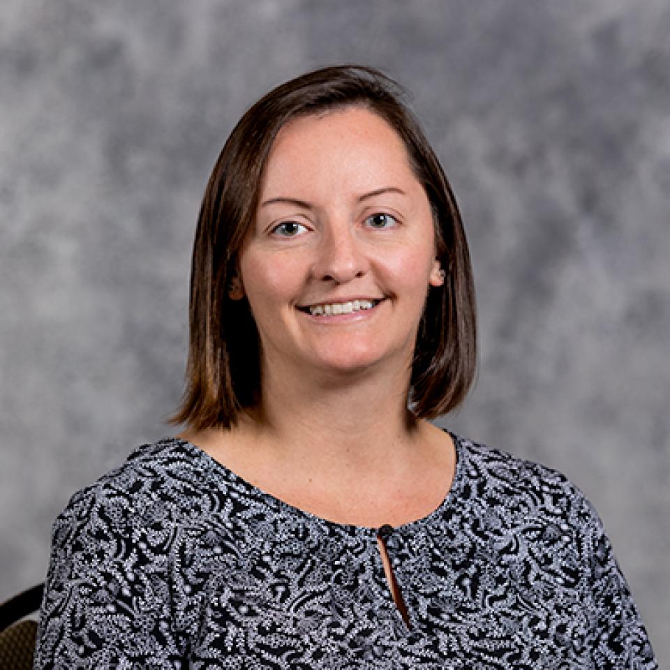 Professional headshot of Leigh Neys